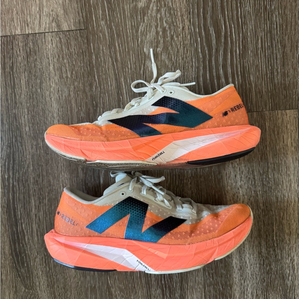 New Balance Rebel v4 Orange White Running Shoes sz 9.5